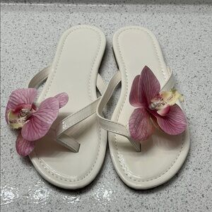 Chic White Sandals with Pink Floral Accents